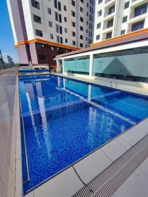 elegant classy apartments in kilimani with swimming pool fully equipped gym ,ample parking space and rooftop chill space